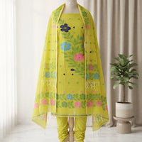 A three-piece women's salwar kameez suit set in bright yellow, the set includes a printed yellow kameez top, matching yellow trousers, and a coordinating yellow dupatta with colorful floral embroidery.