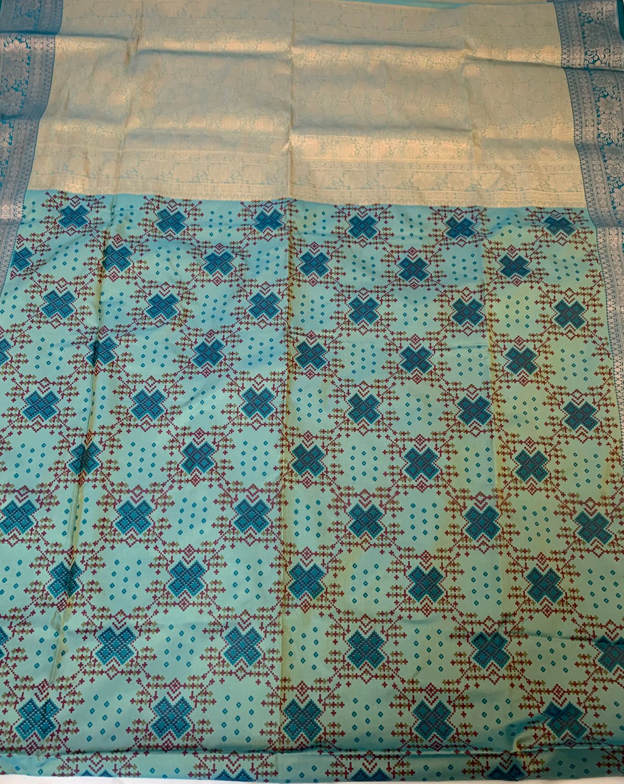 Sea Green Patola Silk Saree with Zari Border